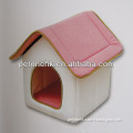 pink covered dog house